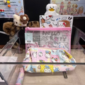 Get 5 Mystery Capsules in Hello Kitty Theme including makeup pouch, stamp, fairy headband, diary book, and key charm.
