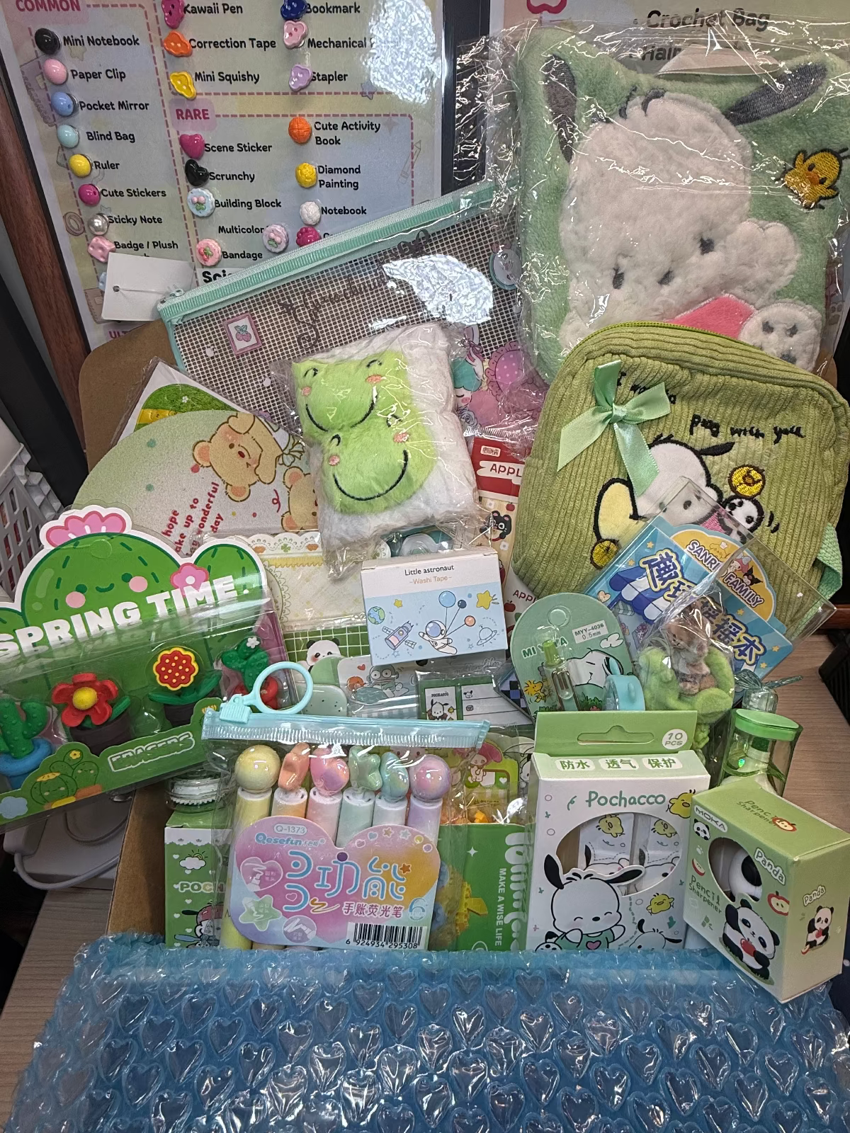 Example of Toffee's Fresh Scoop, including various stationeries such as highlighter, kawaii pen, correction tape, washi tape, pocket mirror, mini squishy, activity book, bookmark, box cutter, paper clip, ruler, hair brush, headband, sticket note, memo pad, coaster, eraser, pencil sharpener, blind box, makeup pouch, hand towel, sticker sheet and mechanical pencil...etc